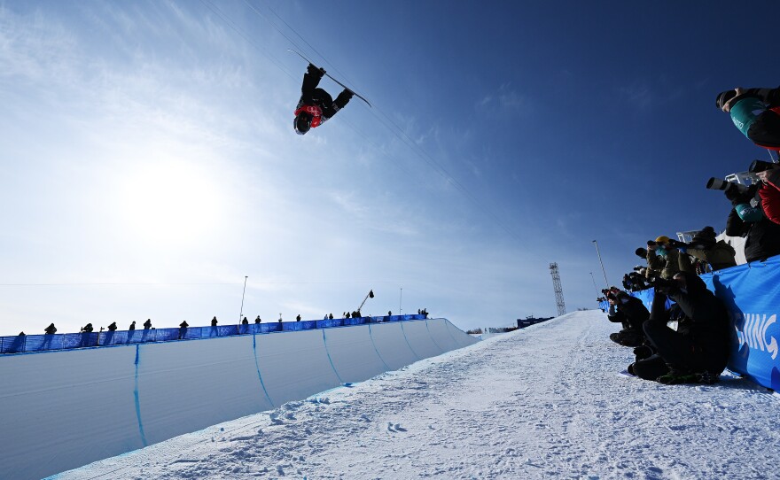Shaun White of Team USA performs a trick during the Men's Snowboard Halfpipe Final at the Beijing 2022 Olympics.