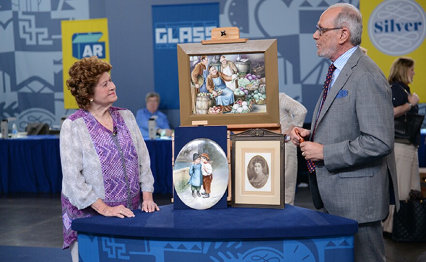 David Lackey (right) appraises a Sidonia K. Goldman porcelain plaques, ca. 1910, in Orlando.