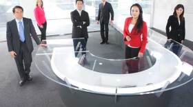 "NEWSLINE" presenters on set. "NEWSLINE" features global news and current affairs, business, sports, science and technology trends plus global weather forecasts from more than 30 news bureaus throughout the world. The daily series is produced by NHK, Japan’s leading public broadcaster. Presenters include Catherine Kobayashi, Gene Otani and Hideshi Hara.