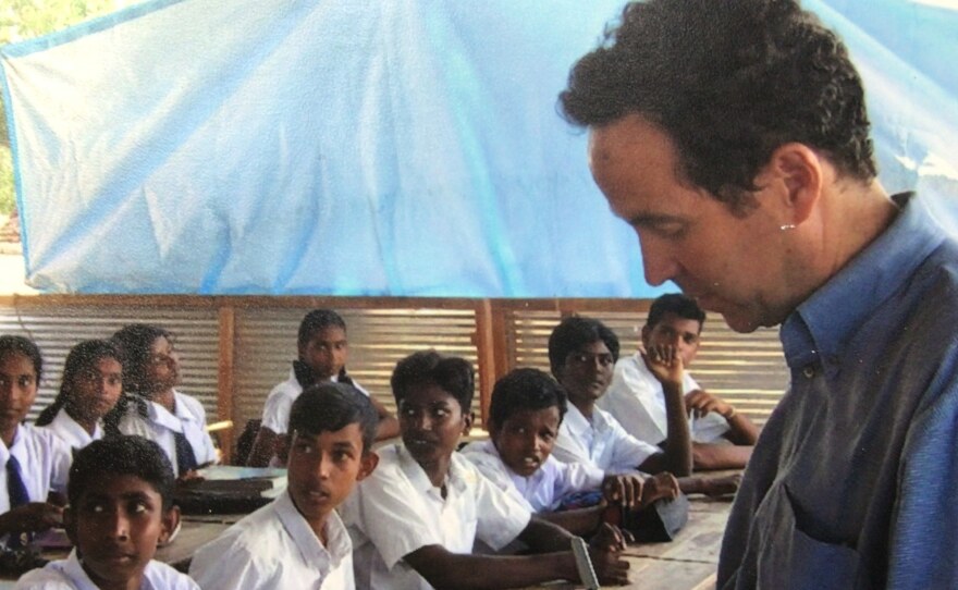 Joel Charny, who's been a humanitarian aid worker for 40 years, talks to students at a camp for internally displaced people in northern Sri Lanka in 2005. It's one of his favorite photos, he says, "because this is what I did hundreds of times: interview people about what they were going through and what they needed for their lives to improve."