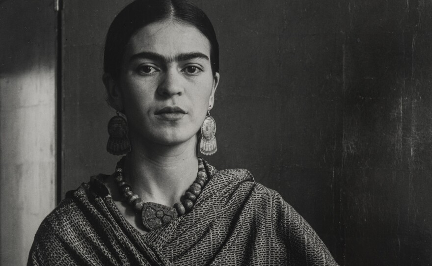 Kahlo, seen here in 1931, started painting seriously after a car crash left her spine and pelvis permanently damaged.