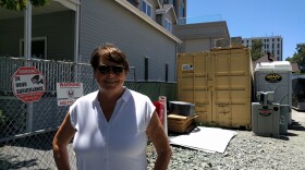 Maureen Sedonaen, CEO of Habitat for Humanity Greater San Francisco, stands in the vacant lot where the nonprofit is looking to build new affordable housing in this undated photo. 
