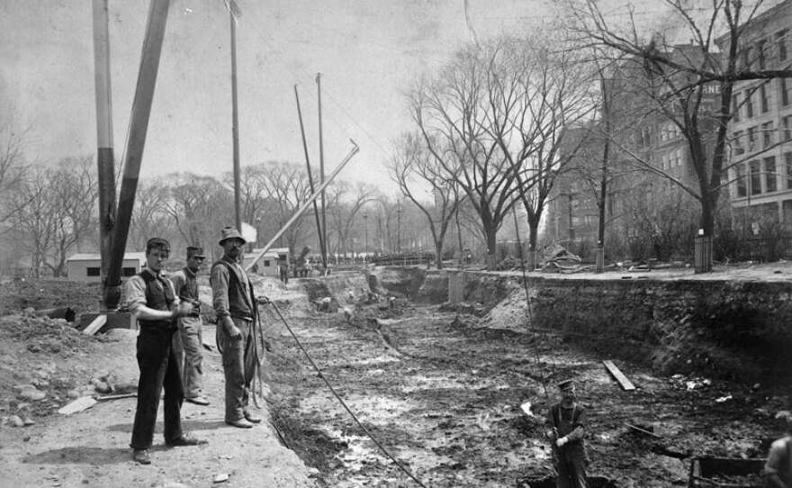 Workers overlooking construction of subway in Boston Common (April 1895).