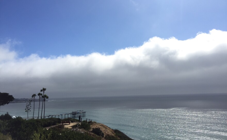Scripps Pier is is shown with a marine layer of clouds over the Pacific Ocean in an undated photo.
