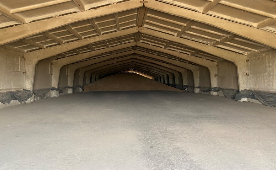 Some of the remaining 5,000 tons of wheat Mykhailo Liubchenko harvested last season. A Russian blockade of the Black Sea has prevented him from selling the rest of last year's haul.
