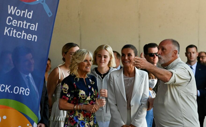 Spain's Queen Letizia and first lady Jill Biden speak with chef Jose Andres, of the World Central Kitchen association, during a visit of a reception centre for Ukrainian refugees on June 28, 2022.