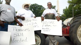 In 2002, five years after a group of black farmers sued the U.S. Department of Agriculture, these men traveled from Manning, S.C., to join a protest outside the USDA.