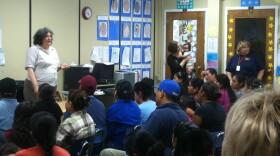 <p>Monica Hernandez of the Southeast Immigration Rights Network addresses a Know Your Rights meeting at Tarrant Elementary School, just north of Birmingham, Ala.</p>