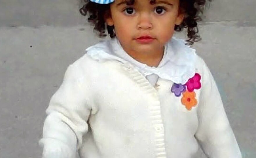 This October 2011 photo provided by Melanie Capobianco shows her adoptive daughter, Veronica, trick-or-treating in Charleston, S.C. The child has been the focus of a custody battle between her adoptive parents and her birth father.
