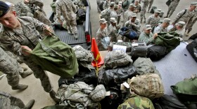 Airmen get processed in on Joint Base McGuire-Dix-Lakehurst, N.J., Oct. 28, 2012, before they go out to assist at emergency shelters before Hurricane Sandy makes landfall. The airmen are assigned to the New Jersey National Guard's 108th Wing.