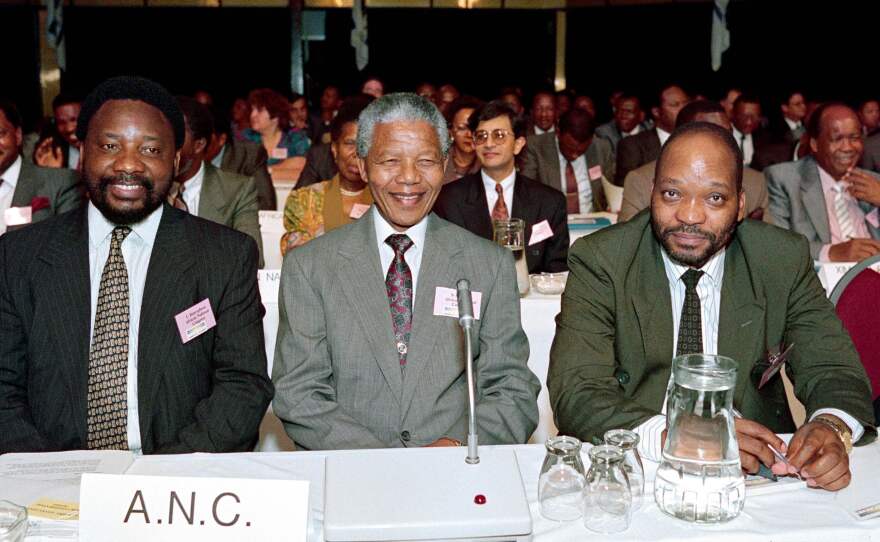 From left, Cyril Ramaphosa, Nelson Mandela and Jacob Zuma, representatives of the African National Congress party, attend the two-day Convention for a Democratic South Africa, in December 1991 in Johannesburg. The three represent half of the country's first six post-apartheid presidents.