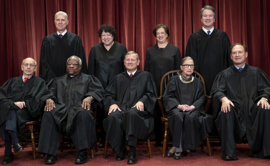 The Supreme Court justices, pictured in November 2018, start a new term on Monday.