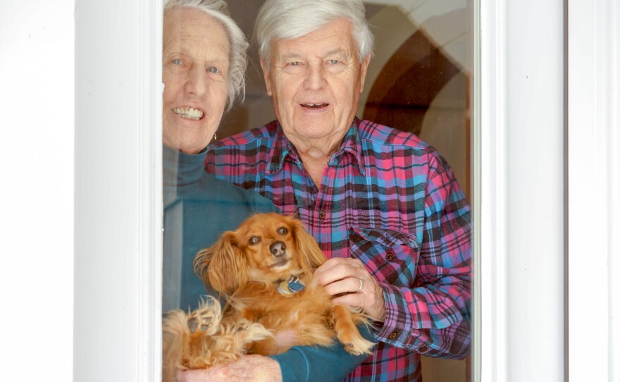 Dwight Cabot Camp, 84, with his wife, Kay, and their dog, Cabbie.