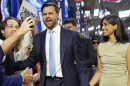 Republican vice presidential candidate Sen. JD Vance, R-Ohio, and his wife Usha Chilukuri Vance arrive on the floor during the first day of the 2024 Republican National Convention at the Fiserv Forum, Monday, July 15, 2024, in Milwaukee.