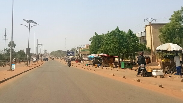 FILE - Motorcyclist ride along a street in Niamey, Niger, Thursday, June 18, 2026.