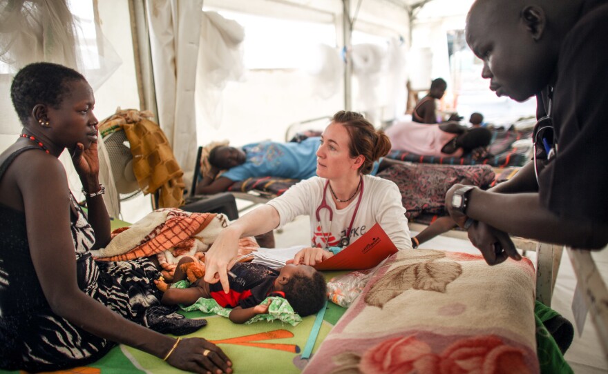 Dutch doctor Jiske Steemsna examines a patient. Working in the camp, she says, "has really high highs and deep lows, but I'm happy to be here."