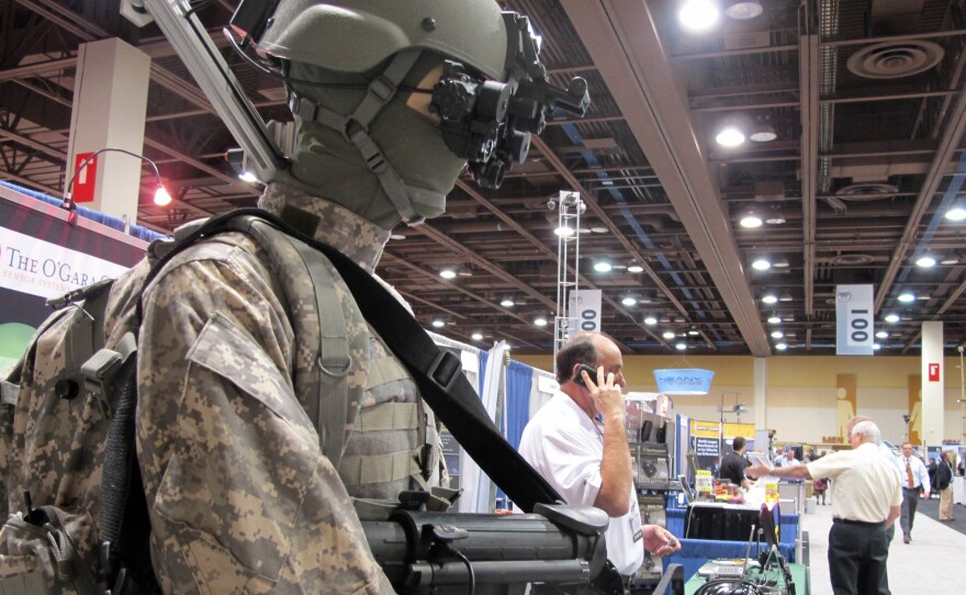 A mannequin in night-vision goggles is part of a display at a border-security expo in Pheonix last year. Defense companies are seeking growth in markets in the developing world, or in homeland and cyber security.