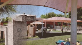 An image of a drinking fountain is overlaid on the empty play yard of a preschool in this photo illustration