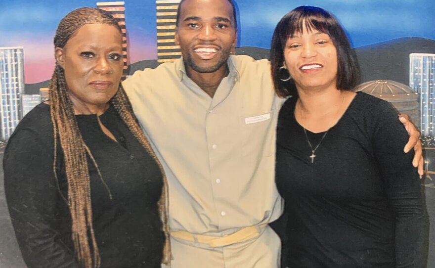 Bobby Everson with his aunt Angela Everson (left) and his sister Ebony during a 2018 visit at a federal prison in South Carolina.