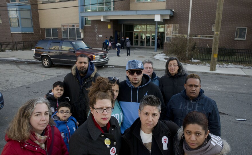 Pennsylvania: Feltonville School of Arts and Sciences teachers, parents and students pose for a portrait in Philadelphia. Nearly 20 percent of students at a Philadelphia middle school won't be taking the state's annual standardized tests after teachers informed parents of the right to opt out of the assessments.