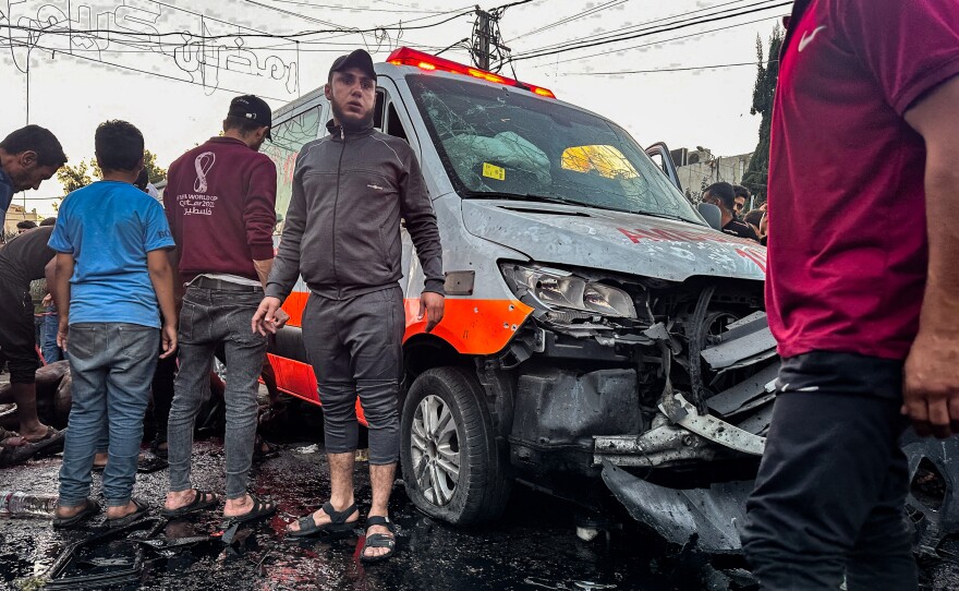 An Israeli air strike damaged this ambulance in front of Al-Shifa hospital in Gaza City on November 3. Israel said the vehicle was "identified ... as being used by a Hamas terrorist cell" and that a "number of Hamas terrorist operatives were killed." Hamas denied the presence of fighters in the ambulance convoy, calling the claims "baseless."