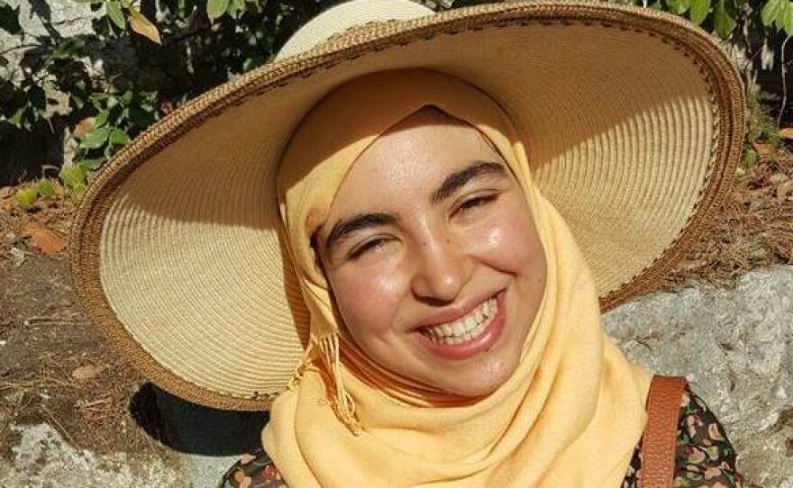Amina Belaroui, 24, the sister of Majda, also volunteered for the military reserves. She didn't want to remove her scarf and hijab, but reluctantly agreed to do so. "I really want to commit and help people," she said.