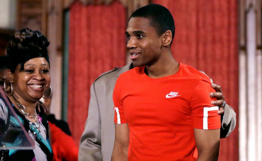 Davontae Sanford stands with his mother, Taminko Sanford during a news conference a day after he was released from prison.