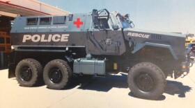A photo of the 2013 Caiman MRAP acquired by the San Diego Unified School District Police Department. The decals have been digitally rendered onto the vehicle. 