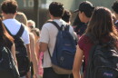 Students walk into Patrick Henry High School on San Diego Unified's first day of school on Monday, Aug. 10, 2026.