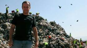 Vik Muniz at the world's largest garbage dump, Jardim Gramacho, on the outskirts of Rio de Janeiro.