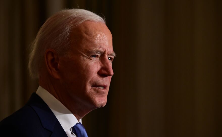 President Joe Biden swears in presidential appointees during a virtual ceremony in the State Dining Room of the White House on Wednesday. Data on Thursday showed new claims for state unemployment benefits reached 900,000, showcasing the weakening jobs picture in the country.