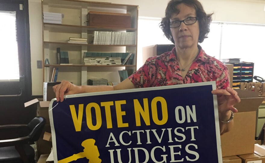 Susan Guthrie works for Kansans for Life, the state's most vocal anti-abortion organization and one of the groups campaigning against some of the Supreme Court justices up for re-election.
