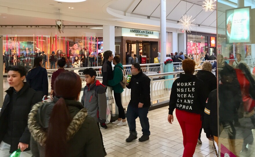 Shoppers packed malls like Tysons Corner Center in northern Virginia Friday.