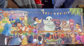 Patrick Ballesteros and Genevieve Santos collaborated to create "Close-Open, Close-Open" which is a limited edition Comic-Con print. Photo taken July 23, 2026.