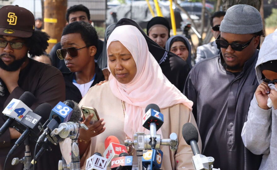 Hawaa Abdullah, daughter of security guard Amin Abdullah, spoke at a press conference on May 19, 2026.