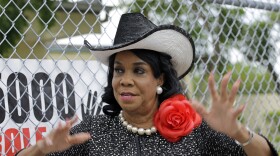 Rep. Frederica Wilson, D-Fla., talks to reporters, Wednesday, Oct. 18, 2017, in Miami Gardens, Fla. 