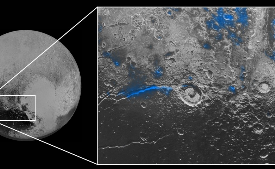 Parts of Pluto's surface that have exposed water ice are highlighted in blue, in a composite image from NASA. The space agency says the water ice appears on parts of the surface that are red.