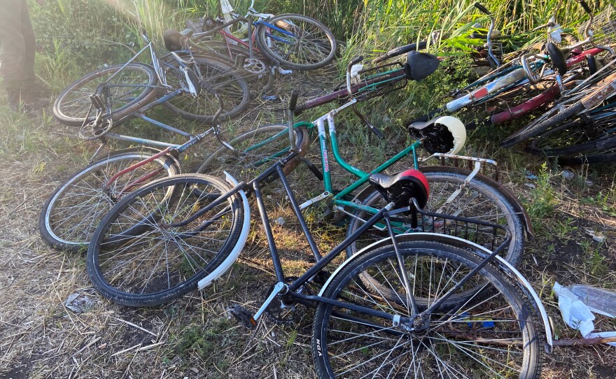 Bikes used by Ukrainian villagers to flee Russian-occupied territory in Kherson region form a pile in Zelenodolsk, in the neighboring Dnipropetrovsk region. Residents fleeing have to sneak past Russian checkpoints and brave intermittent shelling.