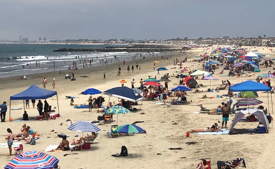 Newport Beach, with rock groins or jetties visible in the distance, July 11, 2019.