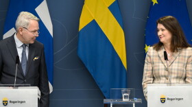 Finnish Foreign Minister Pekka Haavisto, left, and his Swedish counterpart Ann Linde, take part in a joint news conference in Stockholm on Feb. 2, 2022, after talks on European security.