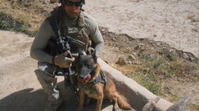 Marine Cpl. Daniel Cornier and his colleague, Chaak, in Afghanistan. "Pretty much trust him with my life," Cornier says.