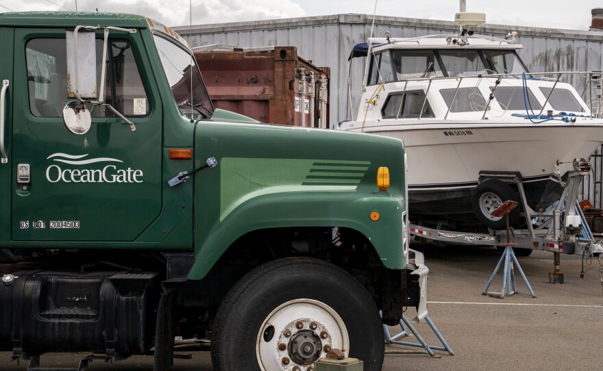 The OceanGate logo is seen on a vehicle stored near the company's offices on Wednesday in Everett, Wash. The company owns the submersible that has been missing since Sunday.
