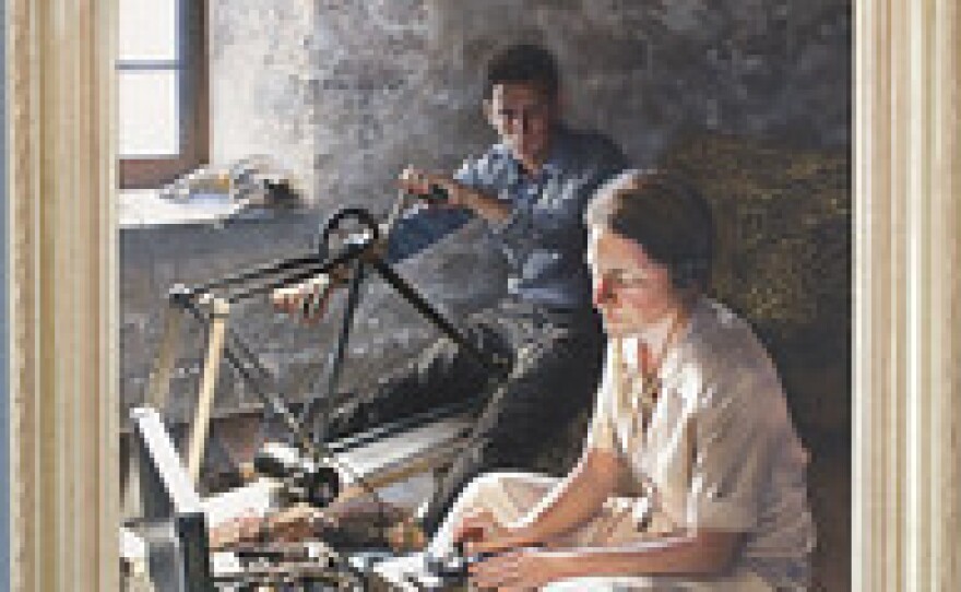 This painting of Virginia Hall hangs in one of the main hallways near the entrance of CIA headquarters. The painting shows her making radio contact with London from an old barn in France to request supplies and personnel. Power for her radio was provided by a bicycle rigged to power an electric generator.
