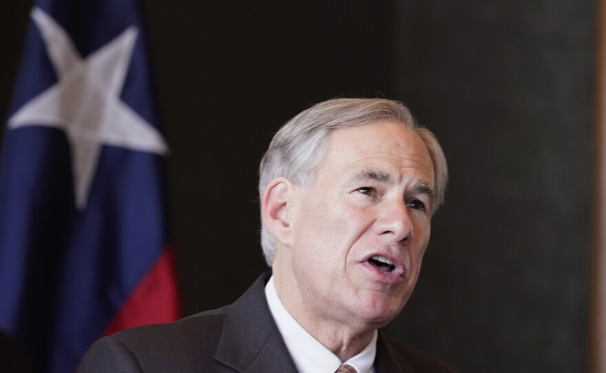 Texas Gov Greg Abbott pictured in March. He has threatened to block the pay of lawmakers who left the state House chamber rather than vote on a bill they say would make it harder to vote.