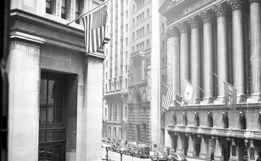 <p>The "House of Morgan," pictured at left in 1943, was built in 1914 to house the offices of J.P. Morgan and Co. The building was developed into condominiums beginning in 2004, and J.P. Morgan's headquarters are now located in midtown Manhattan.</p>