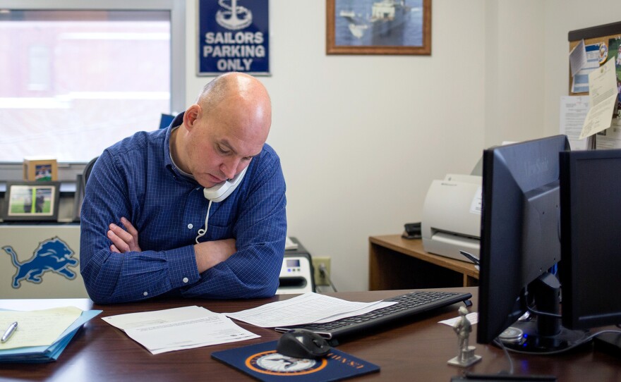 Grant County VSO Bob Kelley makes calls in his office at the Grant County Government Building in Marion, Ind., in Jan. 2015.