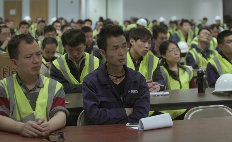 Chinese workers at Fuyao Glass America attend training to learn about American culture.