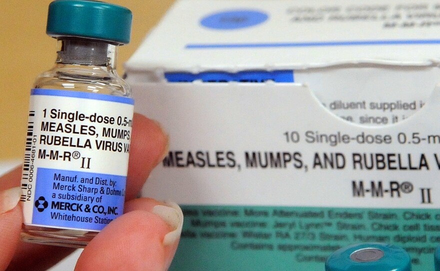 A nurse displays vials of measles vaccine at the Orange County Health Department in May. Health officials said Thursday that new U.S. measles cases for 2019 so far have broken a 25-year-old record.