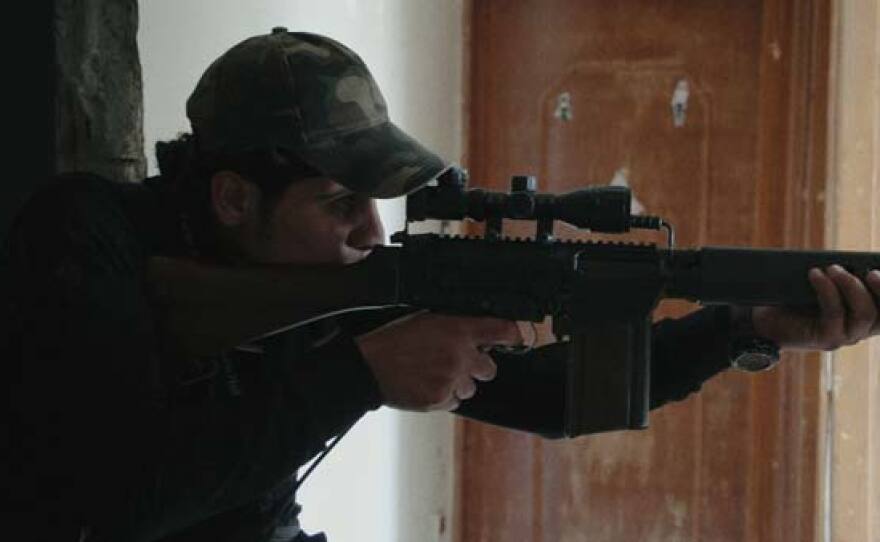 Basset Al-Sarout takes aim on Assad forces.