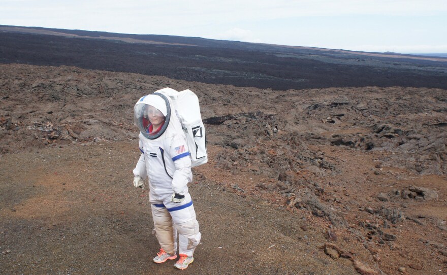 Last year, a crew member of the Hawaii Space Exploration Analog and Simulation mission leaves the dome where they were isolated.